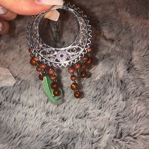 Long Silver necklace with feathers